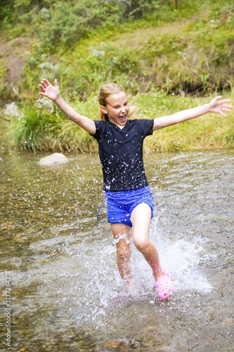 Photo: Girl Running Through Water Girl Running Through Water