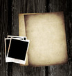 vintage paper and photo on wood background