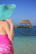 Foto: Beach lady wearing a sun hat. Beach lady wearing a sun hat.