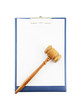 Gavel on clipboard isolated on white