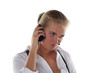 blond woman talking by mobile phone unhappy blond woman talking by mobile phone unhappy