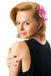 Portrait of beautiful woman with orchid in hair