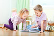 Brother and sister reading
