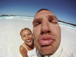Couple Having Fun On The Beach