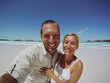 Couple Having Fun On The Beach