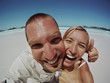 Couple Having Fun On The Beach