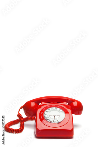 Photo: Antique red phone Antique red phone