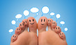 Happy group of finger smileys with social network sign
