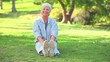 Mature woman doing her stretches outdoors