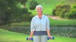 Mature woman bodybuilding outside
