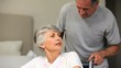 Video: Woman in a wheelchair speaking with her husband Woman in a wheelchair speaking with her husband