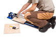 man cut tiles