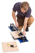 man cut tiles