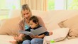 Mother reading to her son
