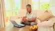 Mature man getting good news on his laptop