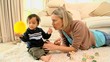 Mother and little boy playing 