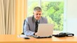 Man in formal suit working