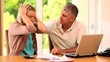 Adult couple calculating their bills 
