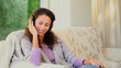 Young woman listening to music with headphones