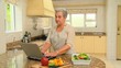 Mature woman looking up a new recipe