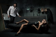 Sexy fashionable couple in dark room