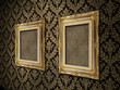 Frames hanging on an angle on a victorian wall