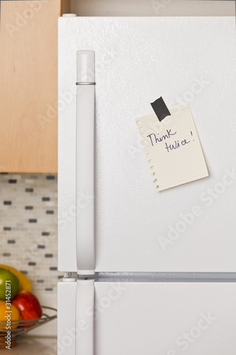 Photo: Note on refrigerator door Note on refrigerator door