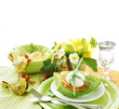 Easter table setting in green and orange tones