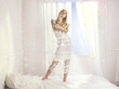 Beautiful woman at the window