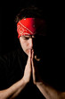 Closeup shot of praying young man Closeup shot of praying young man