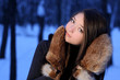 girl the teenager in fur mittens.