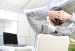 businesswoman resting in the arm-chair
