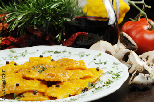 Photo: ravioli al tartufo nero con salsa di zucca rossa ravioli al tartufo nero con salsa di zucca rossa