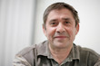 Portrait of mature man smiling. Closeup, shallow DOF.