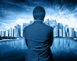 business man looking at the city