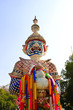 Giant with colorful garland