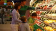 Video: A family of four choosing vegetable in the supermarket A family of four choosing vegetable in the supermarket