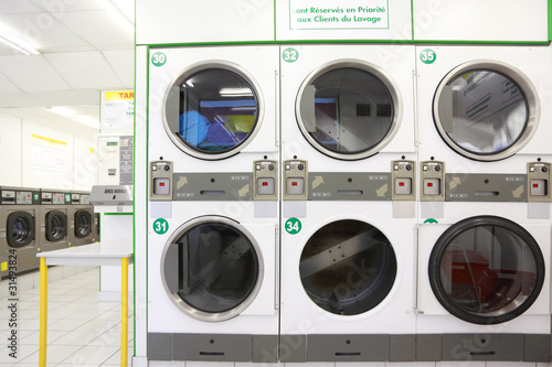 Photo: number of washing machines in empty public laundry number of washing machines in empty public laundry
