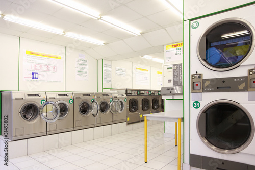 Photo: number of washing machines in empty public laundry number of washing machines in empty public laundry