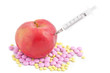 red apple pills and a thermometer