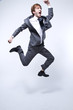 young businessman jumping