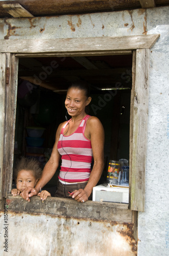 Photo: Nicaragua mother daughter smiling poverty house Corn Island Nicaragua mother daughter smiling poverty house Corn Island