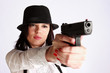 Gangster-girl aiming with the gun Gangster-girl aiming with the gun