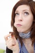 young beautiful woman with a bar of chocolate