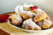 Croissants with Red Rose composition Croissants with Red Rose composition