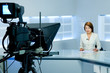 television anchorwoman during live broadcasting