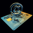 Credit card and arobase sign on black background,3d illustration