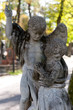 Monument to an angel on a cemetery Monument to an angel on a cemetery