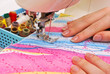 Hand sewing on a machine