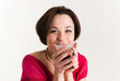 Young woman with a cup of hot drink
